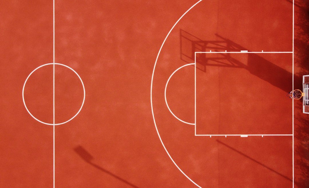 Basketball court viewed from above for an NBA Nuggets vs Thunder game recap