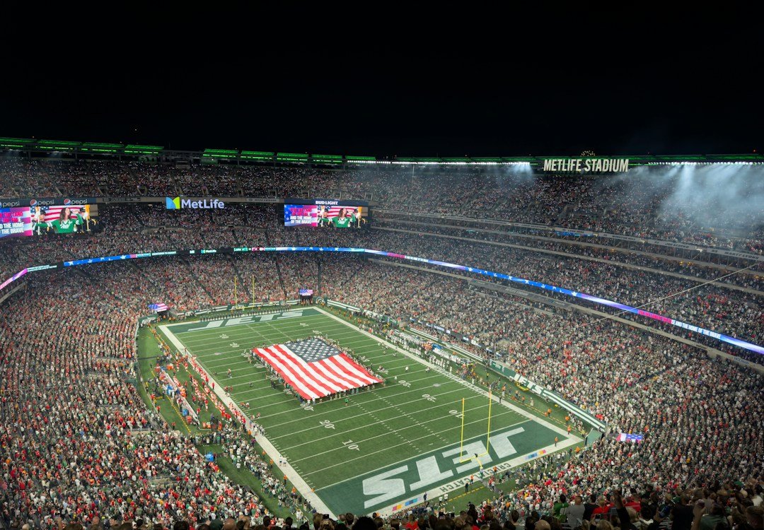 American football stadium filled with fans during a game